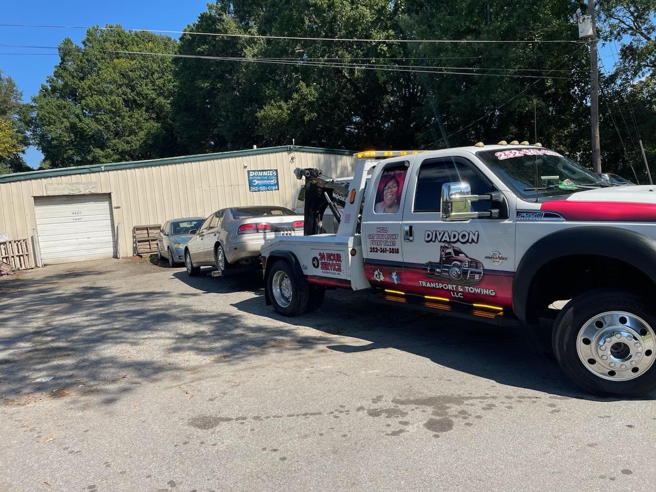 Divadon Transport & Towing flatbed Ford F-450 on a service call in Greenville, NC